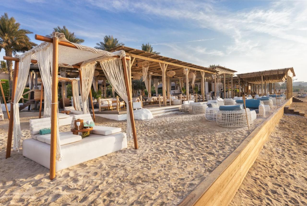 Sofitel Dubai Palm Apartments Exterior photo The beach at the resort