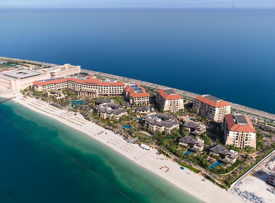 Sofitel Dubai Palm Apartments Exterior photo Aerial view of the resort